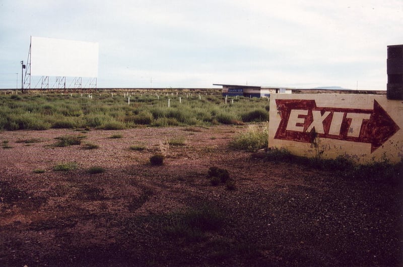 View of field and projection/concession building just behind the ticket booth