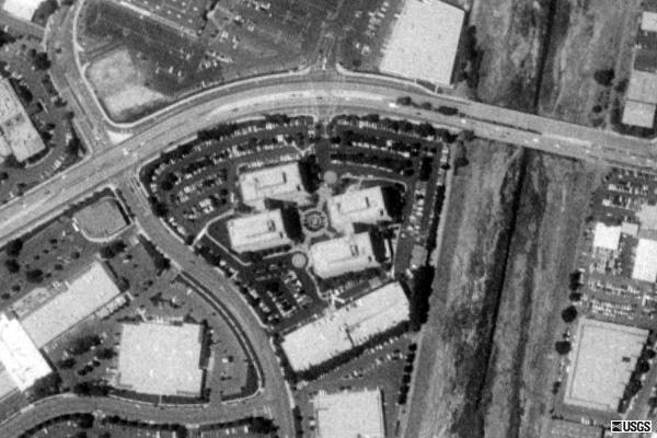 Satellite image: Auto Movies site directly underneath 4 white rectangular buildings
in center of screen