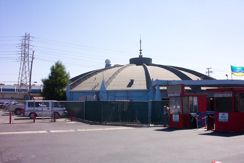 Former snackbar building with old ticket booths visible at right.  They've been moved from their original locatation for foot traffic going into the flea market.