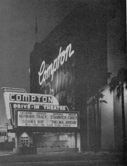 pretty nightime pic of screen tower/mural and marquee