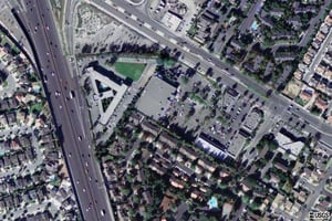 Aerial Photograph of Former Fremont Auto Movie. Now a motel 6, Charter Square Retail Center and housing