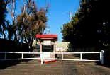 ticket booth, with gates shut (orig. from roadsidepeek.com)