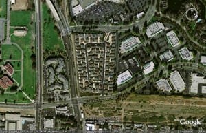 Aerial view of former drive-in site with housing