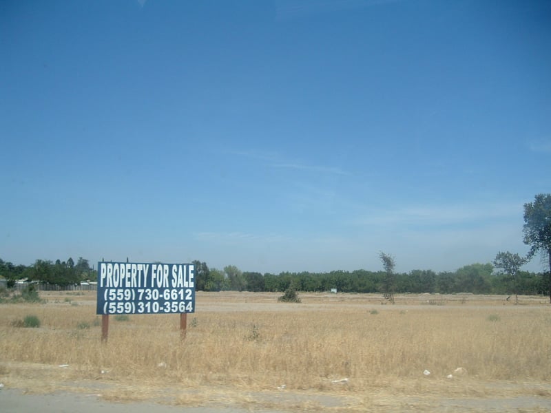 this is what it looks like now torn down & with a for lease sign