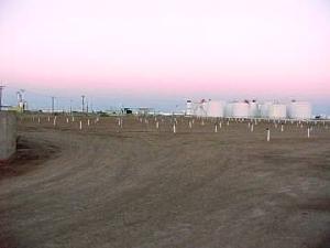 pic of lot, speaker poles, and some background industrial buildings.  i love so much how this one and the last 3 i posted look at sunset(i personally hope to visit this ozoner sometime in my lifetime!).