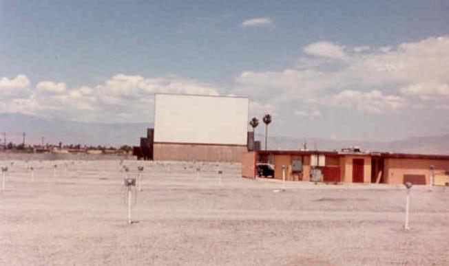 pic of screen, speakers, and projection booth(also probably the concession stand too)