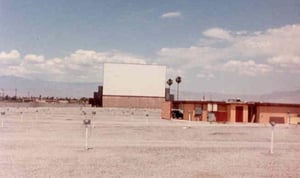 pic of screen, speakers, and projection booth(also probably the concession stand too)