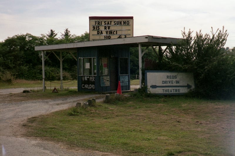 The marquee used to be on the ground in front of the Red's sign. After too much vandalism, they moved it on top of the box office.