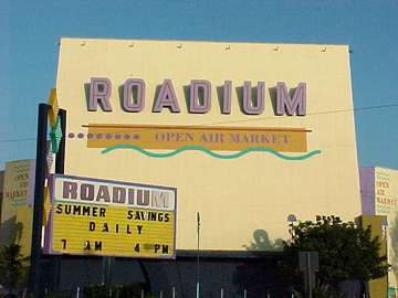 pic of the roadium's old screen and marquee, which still remain despite its reincarnation as a swap meet.