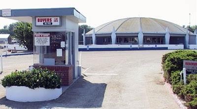 ticket booth, and concession stand building in distance