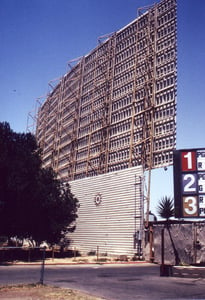 Curved screen next to entrance road