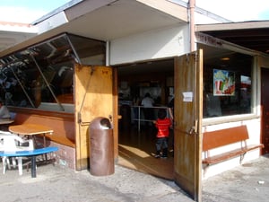 Pic2 of the exterior of the concession building still in use for the swapmeet patrons.