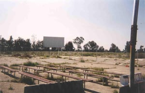 Small picnic area, and screen #2. The tables have been stolen, they weren't bolted down like the benches are.