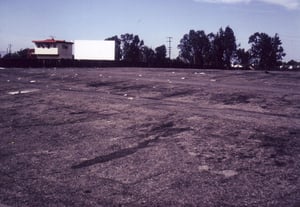 Concrete field with projection booth in tower