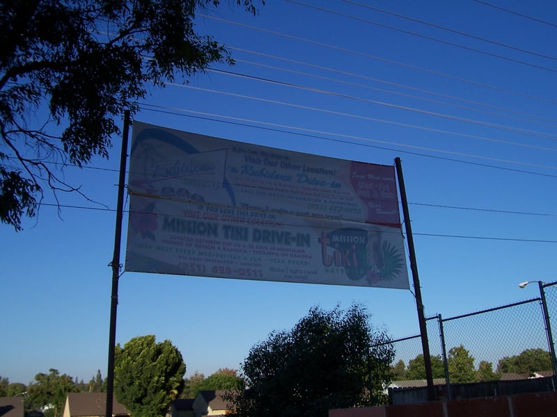 On the driveway leading to the ticket booths, these banners advertised the two other SoCal drive-ins operated by DeAnza. They are the Rubidoux in Riverside and the Mission Tiki in Montclair.