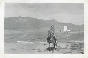 Drive-In with horseback rider  mountains