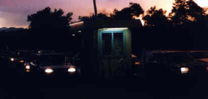 Cars paying at the sole ticket booth.