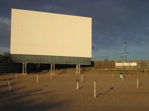 Cinderella Twin Drive-In screen.  The sign says Rock throwers will be evicted.  But we saw only nice people.