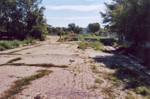 Combined entrance and exit road