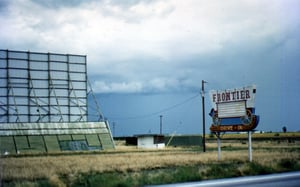 screen tower with neon marquee