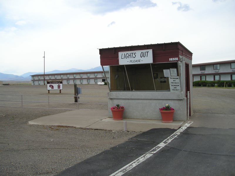 Star Drive-In ticket booth with their motel rooms in background.