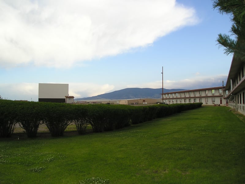 The Star Drive-In motel rooms that face one of the drive-in screens.  You can see the projection booth beyond the hedge.