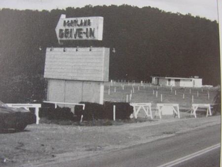 Portland Drive-in Corner of Rt17 and 17A.
North West corner. Shows projection house.
The enterance and the exit have barracades there. The road is Rt 17A. The screen is not in the picture, but it would b 2 the rite.