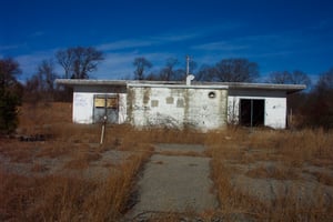 Front view of snack bar with projection booth portholes.