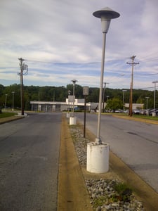 This is the old entrance road to the Newark Drive-in. The area now is the service department for a car dealership.