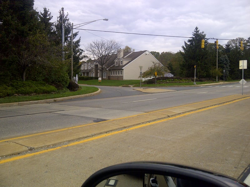 Nothing remains of the entrance or theatre lot but the residential community that replaced it.