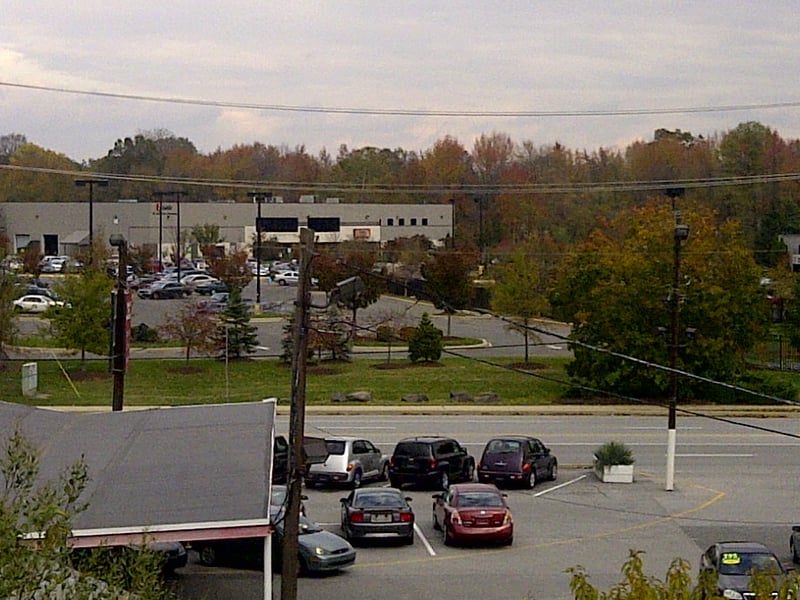 A commercial office complex now occupies the theatre lot. The walk-insit-down theatre next door is gone too where a Walmart now stands.