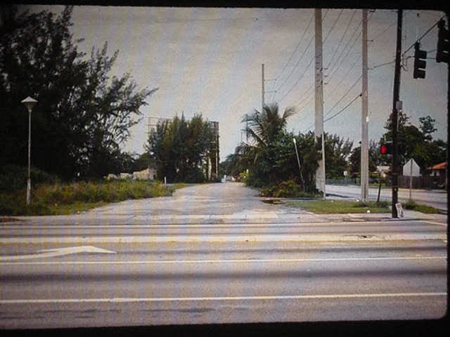 27th Avenue Drive-in was located in Miami Florida. i took this picture in 1993. Looking in a west direction. This is where u
drove in. U can c the back of the screen. The street in the front is NW 27 Avenue. The street on the rite side is NW 87 Street.