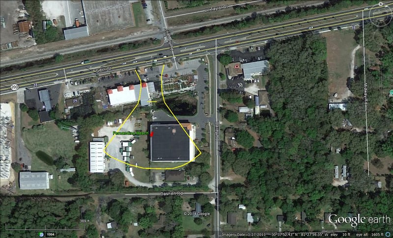 Google Earth image with former site outlined