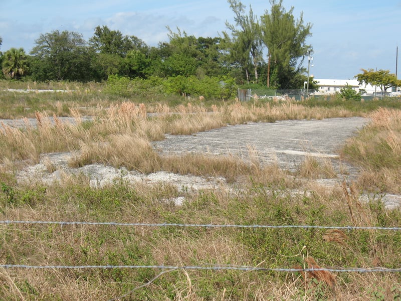 I went to where it was. A little is left. I was standing on NW 81 Street to get the picture looking in a north direction. On top of the picture there is a green fence, behide it is NW 83 Street.