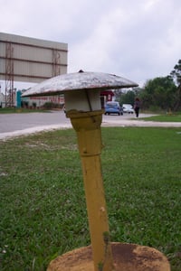 Light fixture on entrance road.