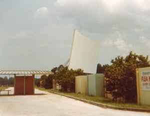 The screen and the back of the box office at the Nova Drive-In. Image is from 1979.