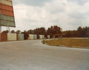 The entrance road and the box office at the Nova Drive-In. Image is from 1979.