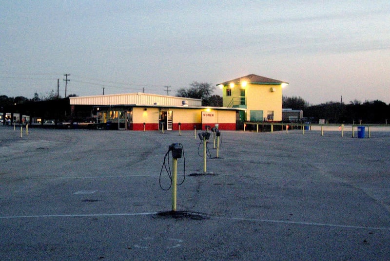 CONCESSION BUILDING. UPPER LEVEL IS FOR SCREEN 2 PROJECTION. NICELY PAINTED, CARED FOR.