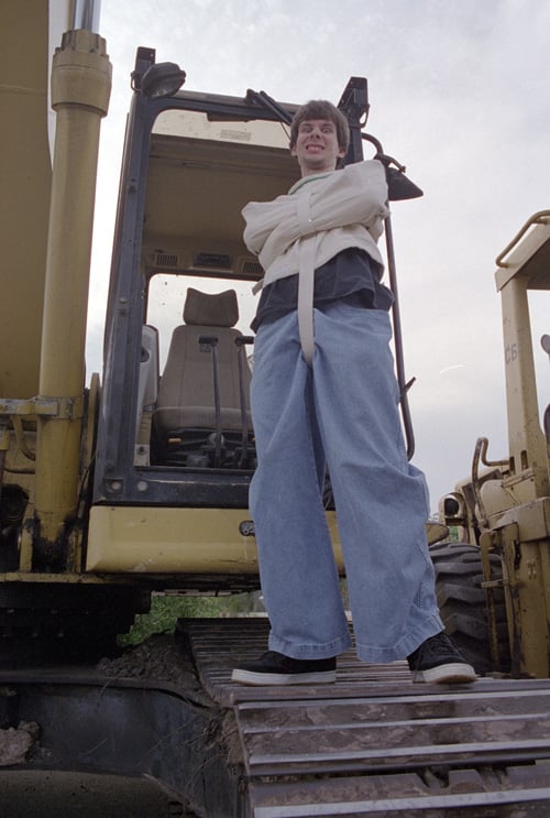 Yours truly in a straightjacket on top of one of the bulldozers, playing the role of the insane/evil/crazy developer out to destroy the ozoner.