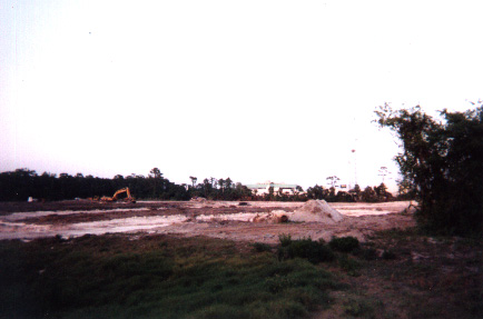 Taken from the viewpoint of the former screen. You can kind of see the remains of the supports in the middle. No trace of a drive-in remains on this site anymore.