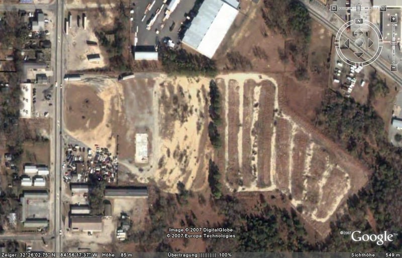 Aerial view of former drive-in site in color