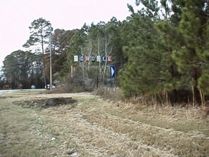 The entrance sign is still visible amongst the trees in 2005.