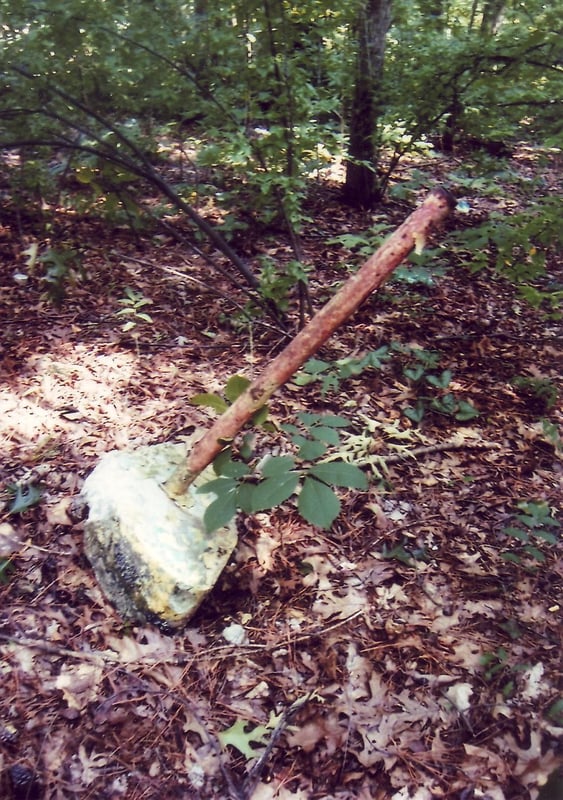Tipped over lonely speaker pole found in the forest