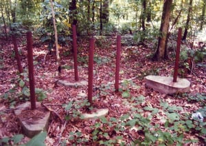 A pile of speaker poles sitting near the area where the screen tower used to be