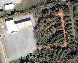 The Martin-Carmike Plaza cinemas can be found on the left and what's left of the drive-in taken on the right