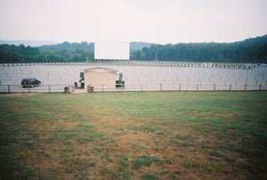 Screen and projection booth at the Wilderness Drive-In in Trenton, Georgia.