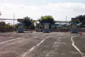 entrance driveway with ticket booths in background.