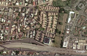 Aerial view of former drive-in site with modern housing
