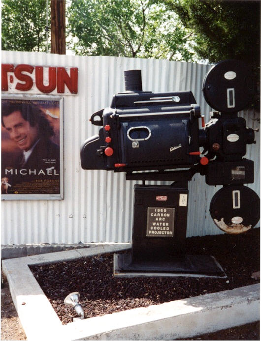 1950 water cooled, carbon-arc projector on dispaly beside the marquee just outside the main entrance.