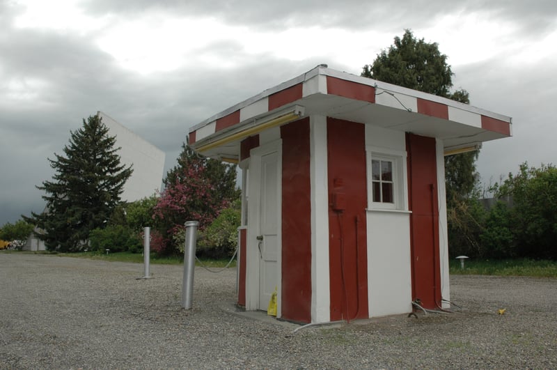 Ticket booth with the screen in the background.